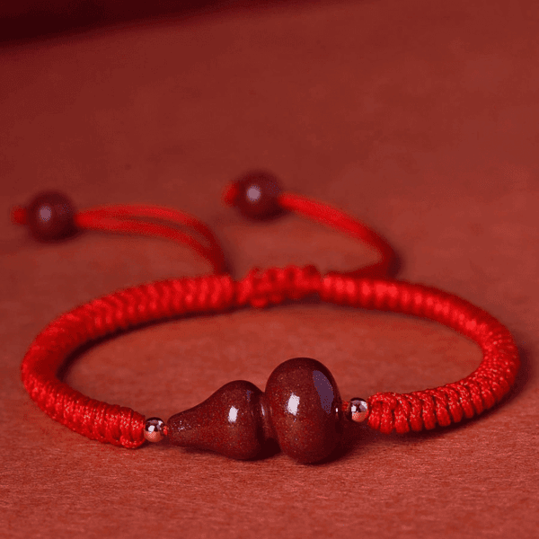 1cb195c2bbe643408ee7c9970de5b858 Purple Goldstone Gourd Red String Bracelet – 3 Colors