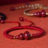 2d47ac7ac8f5bd774f09a0cce41656bb Purple Goldstone Gourd Red String Bracelet – 3 Colors