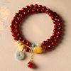 Prosperity & Peace Double-Wrap Bracelet – Red Agate with Jade Donut & Amber Charms