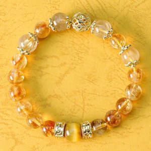 Golden Quartz Fortune Bracelet – Filigree Orb & Prosperity Barrels