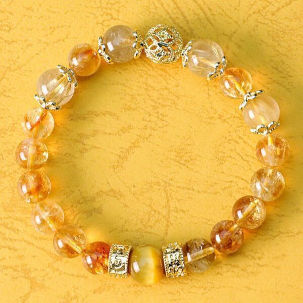 A Golden Quartz Fortune Bracelet – Filigree Orb & Prosperity Barrels