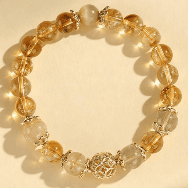 B Golden Quartz Prosperity Bracelet – Luminous Talisman with Filigree Fortune Orb