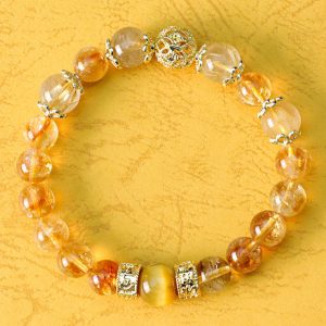 Golden Quartz Fortune Bracelet – Filigree Orb & Prosperity Barrels
